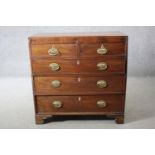 A Georgian mahogany chest of two short above three long drawers on bracket feet. H.87 W.87 D.45 cm.