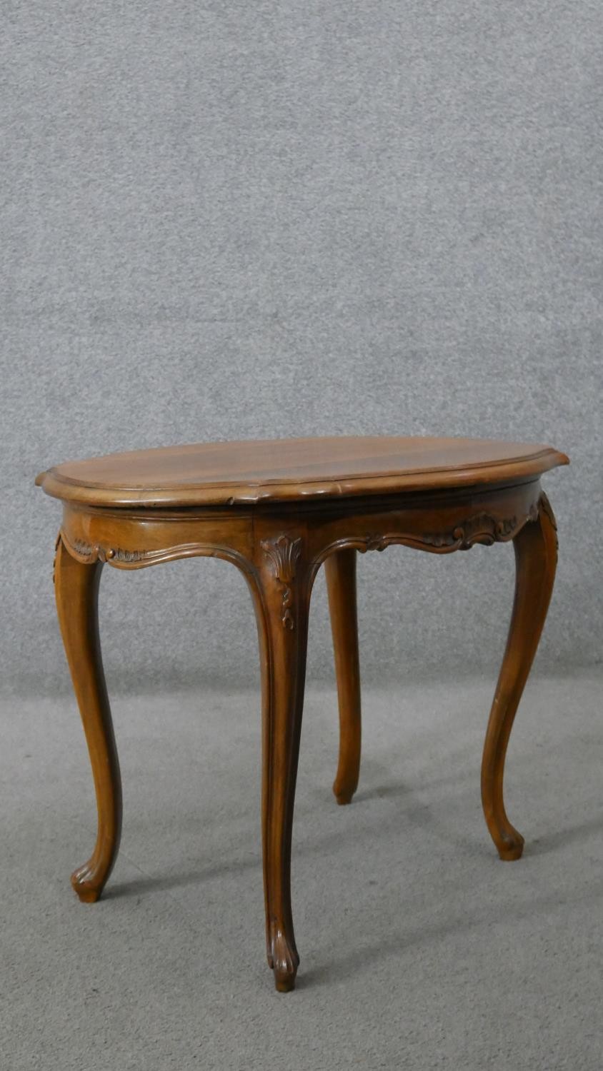 A Continental style walnut centre table on carved cabriole supports. H.55 W.72 D.54CM - Image 5 of 5
