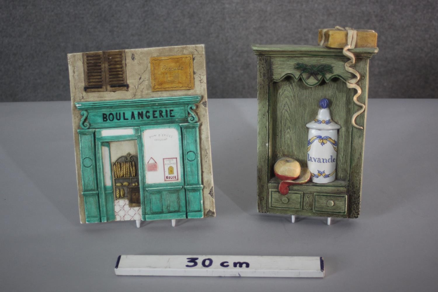 Two vintage relief hand painted ceramic plaques one modelled as the front of a French bakery the - Image 2 of 6