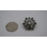 A Victorian metamorphic yellow and white metal (tests as 9ct and silver) floral and clover design