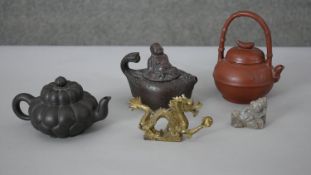 A collection of Chinese items. Including three Yixing tea pots, one in a gourd design and one with a