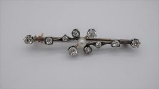 A Victorian yellow and white metal (tests as 9ct and silver) foliate design diamond and pearl bar