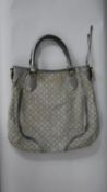 A vintage Louis Vuitton Idylle tote bag in monogram canvas and leather, gray color, hardware in gilt