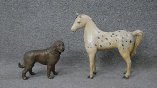 A Victorian painted cast metal horse, with dappled coat along with a cast brass figure of a dog with
