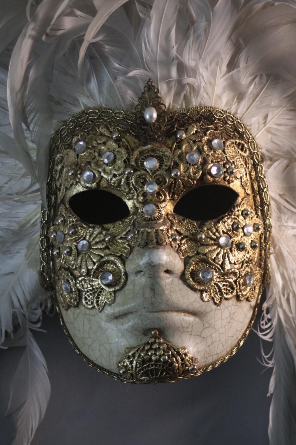 A bespoke Venetian carnival mask, with gilded brocade and white cockerel's feather headdress. H.46 - Image 4 of 6
