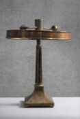 A vintage rosewood and brass inlaid table lamp with twin light fittings. H.46 Dia.36 cm.
