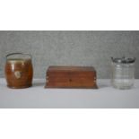 A 19th century walnut Mother of Pearl inlaid jewellery box, an oak ceramic lined biscuit barrel, a