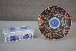 A Meji period Japanese Arita ware plate with foliate design along with a blue and white Chinese blue
