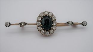 A Victorian yellow and white metal (tests as 9 carat and silver) sapphire and diamond cluster bar