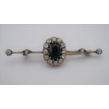 A Victorian yellow and white metal (tests as 9 carat and silver) sapphire and diamond cluster bar