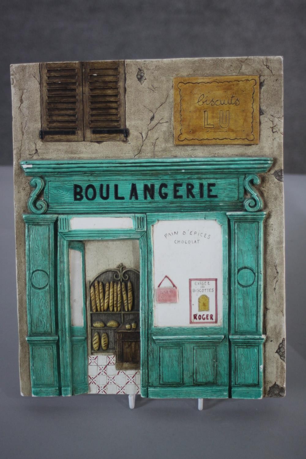 Two vintage relief hand painted ceramic plaques one modelled as the front of a French bakery the - Image 3 of 6