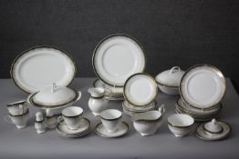 A Royal Grafton 'Majestic' pattern eight person part dinner service. with gilded and dark green