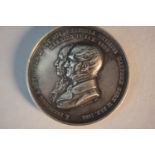 A 19th century 50th wedding day celebration silver medal. Celebrating the marriage of J. Frederick