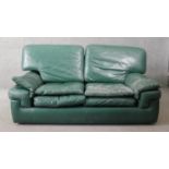 A leather upholstered Roche Bobois two seater sofa. H.79 W.163 W.53cm