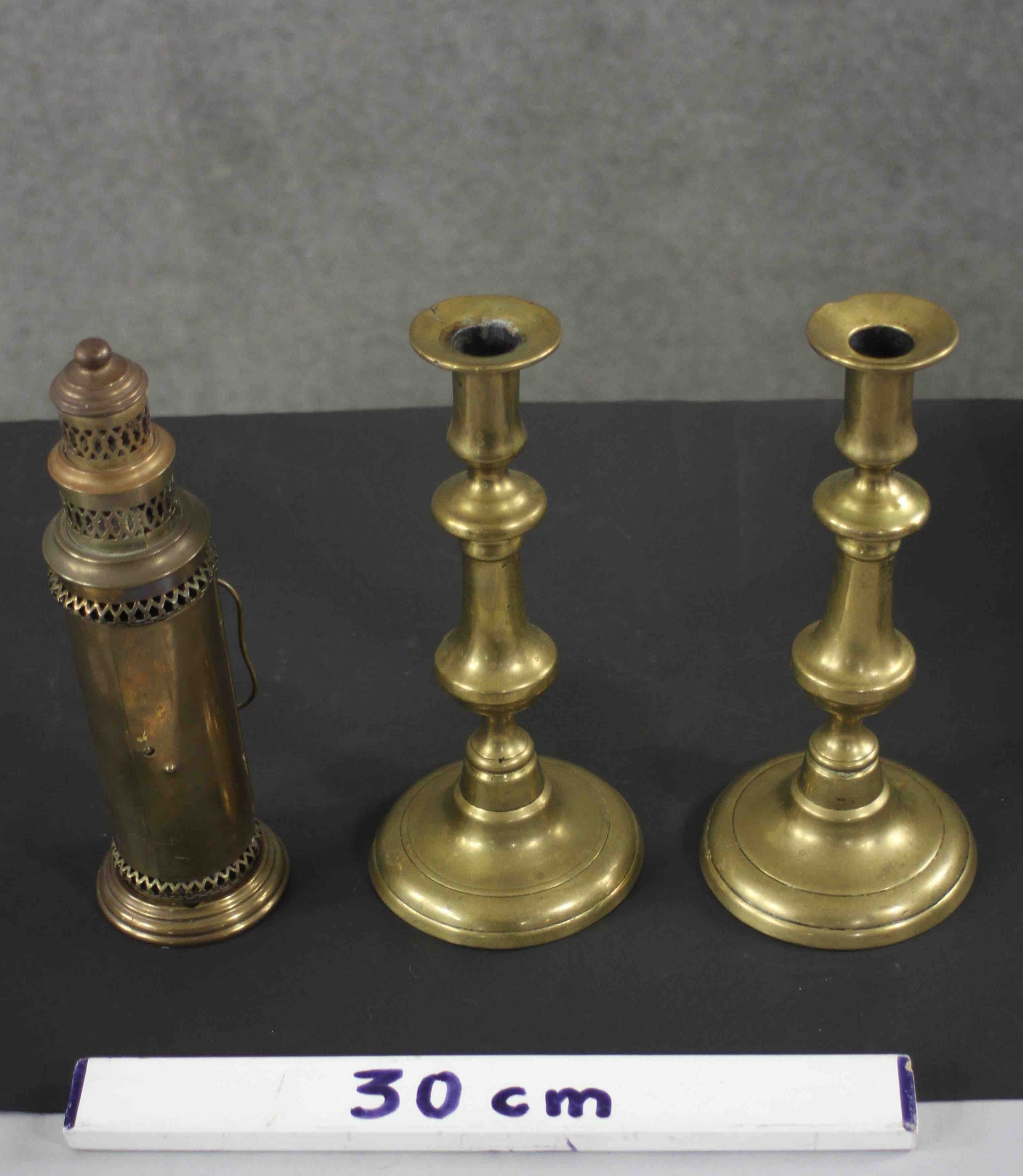 A pair of early 20th century brass candlesticks along with a portable brass candlestick lantern with - Image 7 of 8