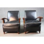 A pair of mid century French Art Deco style beech framed armchairs in piped leather upholstery on