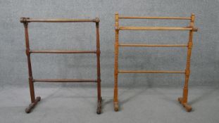 A 19th century towel rail along with a similar example. H.86 W.68 D.24cm (largest)