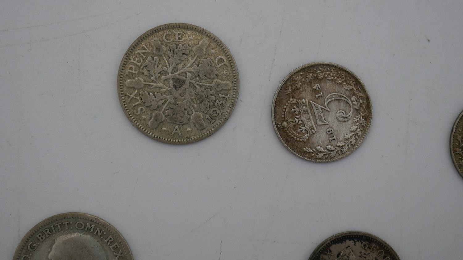 A collection of twenty five 19th and 20th century white metal coins. Including threepences, - Image 11 of 12