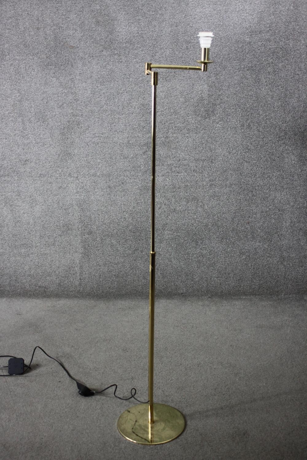 A vintage brass extending standard lamp with hinged articulated arm. H.153 (fully extended) Dia.