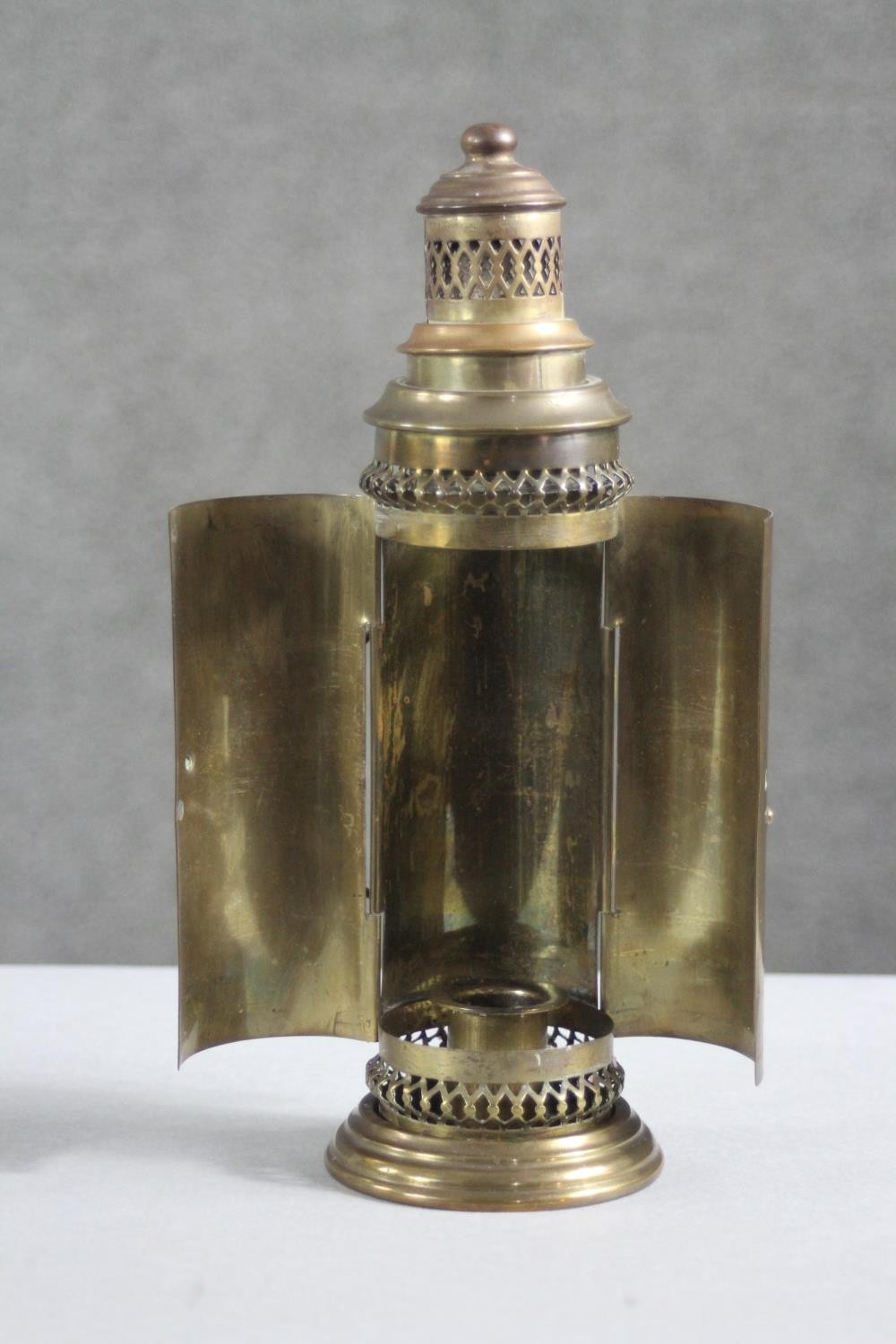 A pair of early 20th century brass candlesticks along with a portable brass candlestick lantern with - Image 8 of 8