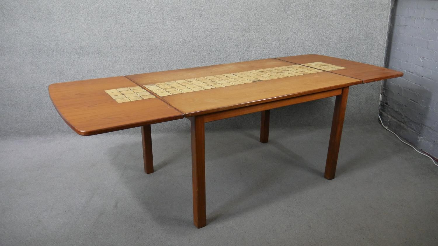 A 1960's vintage teak drop flap dining table with stoneware tile inlaid surface raised on square - Image 5 of 6