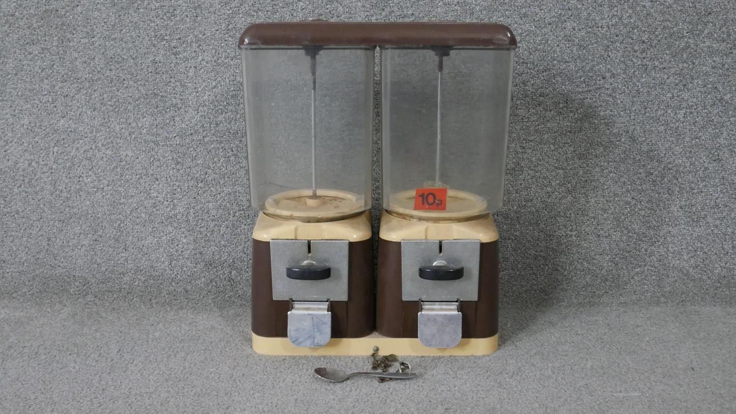 A double vintage sweet dispenser with spoon on chain. (No key)A H.40 W.33 D.16cm