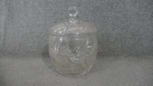 A large Victorian hand cut crystal lidded jar with star design and faceted finial. H.32 Diam.26cm