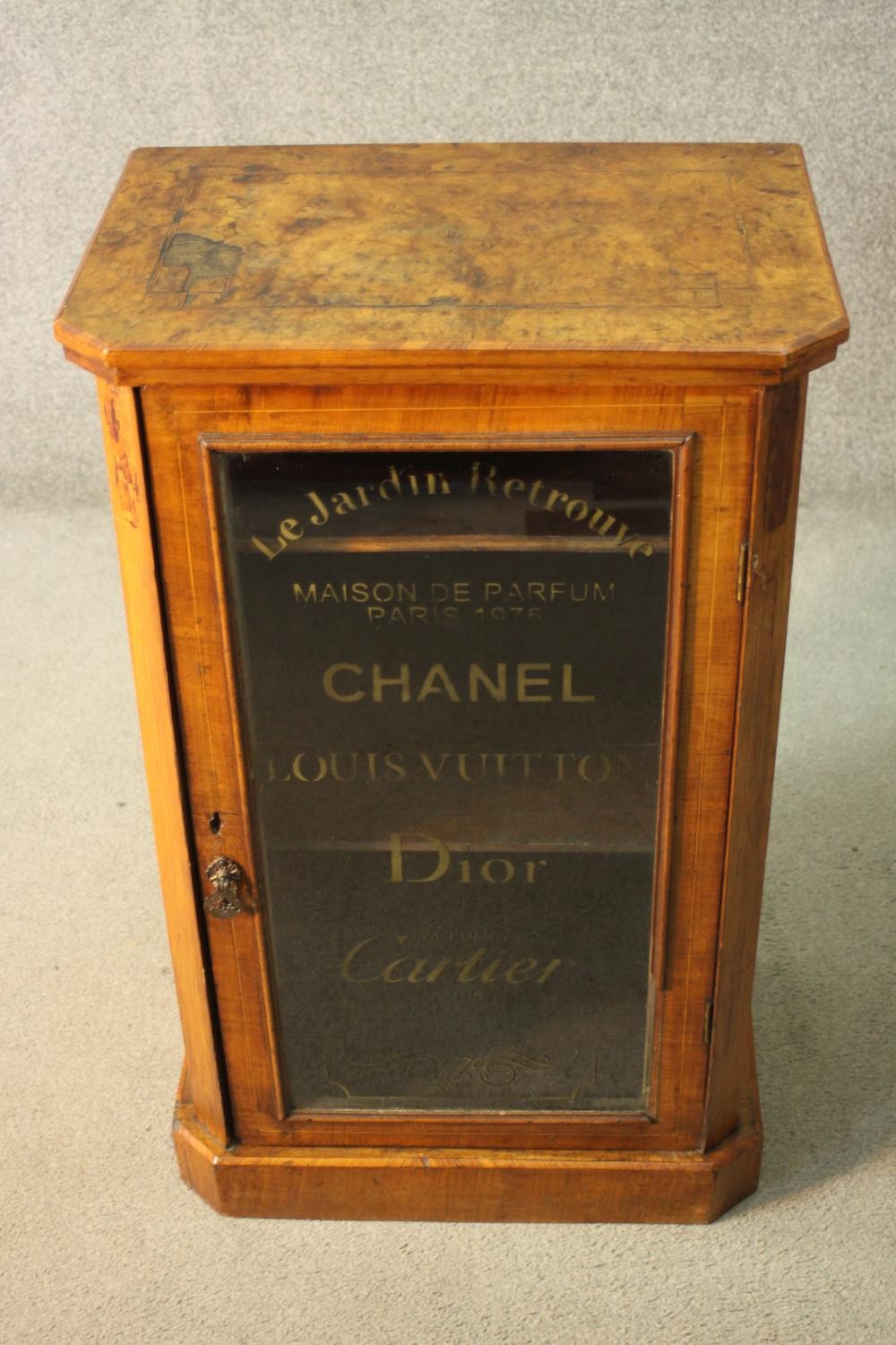 A 19th century burr walnut and satinwood strung pier cabinet with later painted Chanel, Dior and - Image 2 of 7
