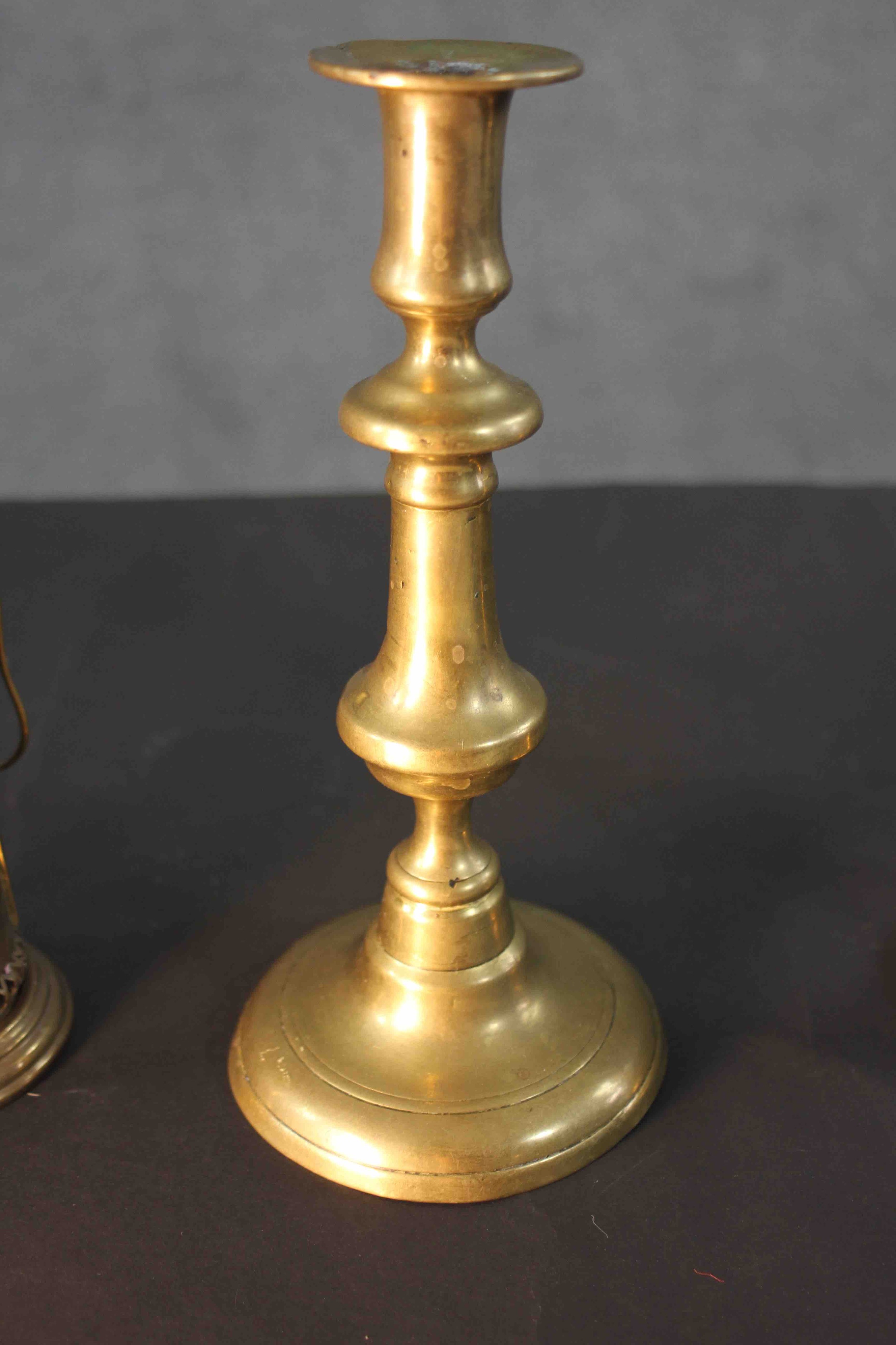 A pair of early 20th century brass candlesticks along with a portable brass candlestick lantern with - Image 6 of 8