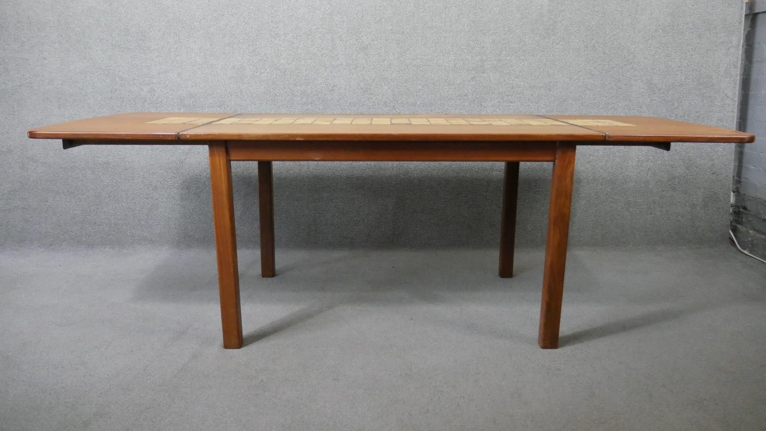 A 1960's vintage teak drop flap dining table with stoneware tile inlaid surface raised on square - Image 4 of 6