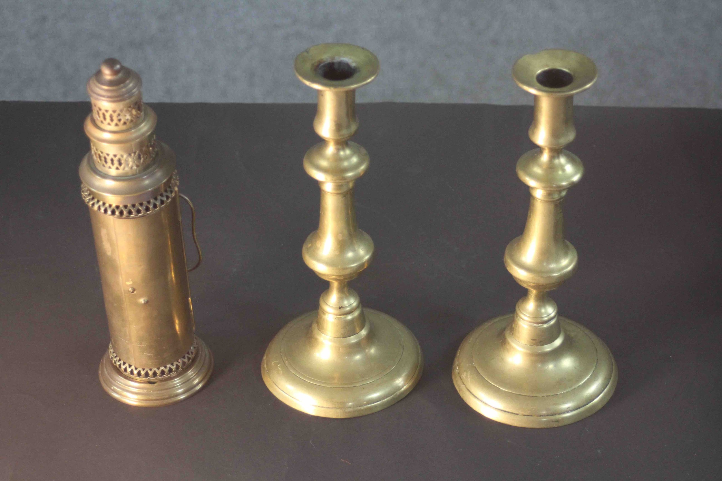 A pair of early 20th century brass candlesticks along with a portable brass candlestick lantern with - Image 2 of 8