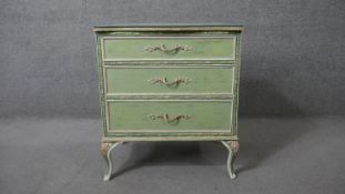 A mid century Continental style distressed painted chest of drawers on cabriole supports. H.71 W.
