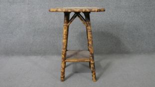 A Victorian bamboo occasional table with faux ceramic tiled top. H.66 W.46 D.46cm