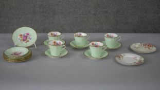 A Imperial china five person coffee set with floral design and 22ct gold detailing along with two