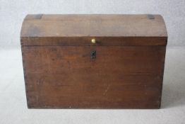 A 19th century ash metal bound domed top travelling trunk with twin carrying handles. H.63 W.94 D.43