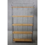 A set of metal framed floor standing open shelves. H.170 W.86 D.24 cm.