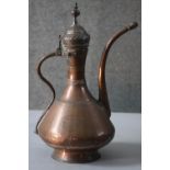 An 18th century copper samovar. The samovar has a snake form handle and is impressed '1798', with