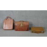 Three vintage tan leather bags. One tan leather doctors bag with brass fittings and two other pieces