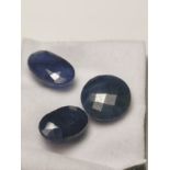 Three mixed cut loose sapphires.