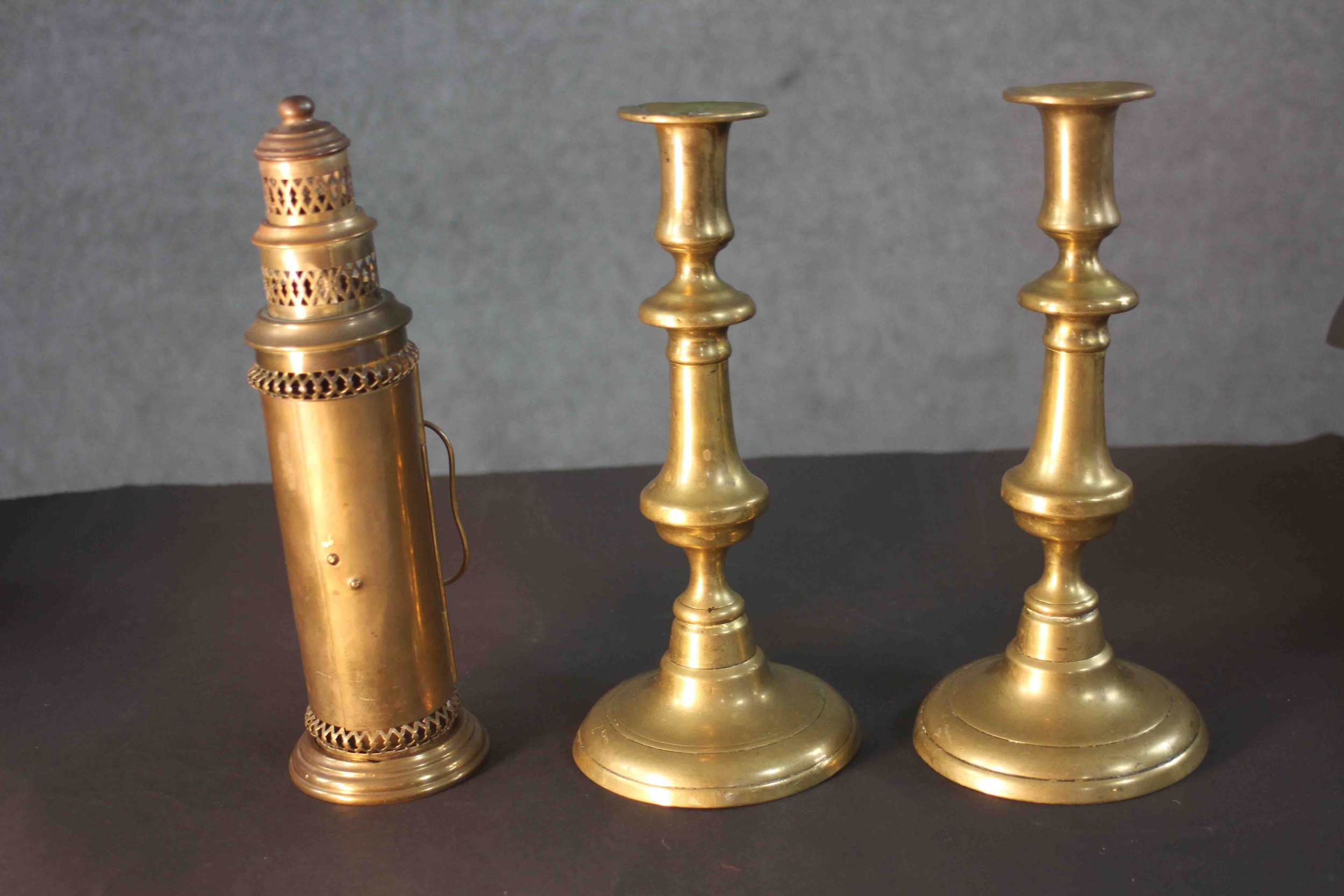 A pair of early 20th century brass candlesticks along with a portable brass candlestick lantern with - Image 3 of 8