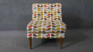A vintage style salon chair in Orla Kiely upholstery.