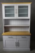 A contemporary painted two part kitchen dresser. H.210 W.124 D. 55cm.