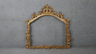 A carved Florentine style gilt moulded frame. H.95 W.81cm (internal) H.116 W.122cm (external)