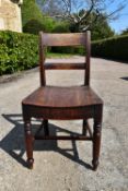 A 19th century mahogany hall chair. H.77 W.42 D.35cm