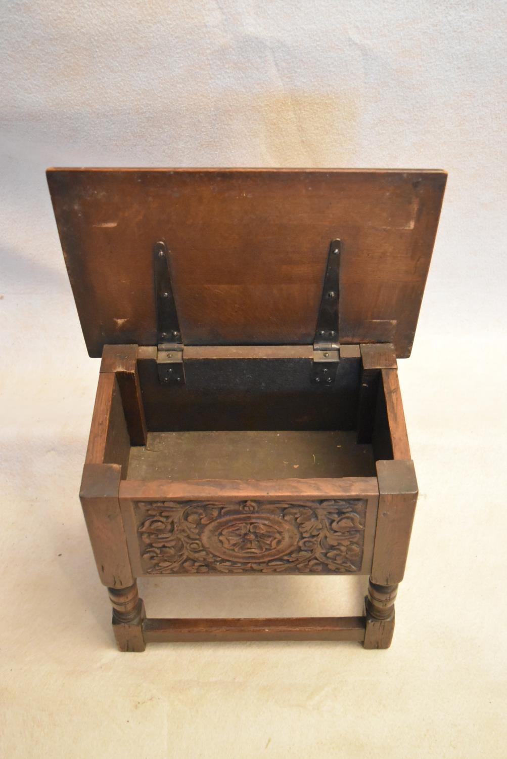An 18th century country oak bible box stool with carved panel on turned tapering supports. H.47 W.44 - Image 6 of 7