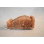 A rock salt table lamp in the shape of a 19th century style scrolling corbel. H.13 W.31 D.16cm