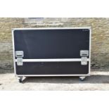 A very large flight case on wheels with brakes fitted. To take a 65" TV kit. H.110 W.169 D.53cm