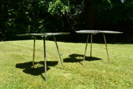 A pair of gilt metal trefoil conservatory or garden tables on tripod legs. H.50 W.64cm