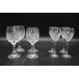 Two sets of four 20th century wine glasses. Four large cut crystal glasses along with four small cut