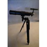 A Bresser Optik Telescope, including lense protector, mount and tripod. H.112 W.60cm